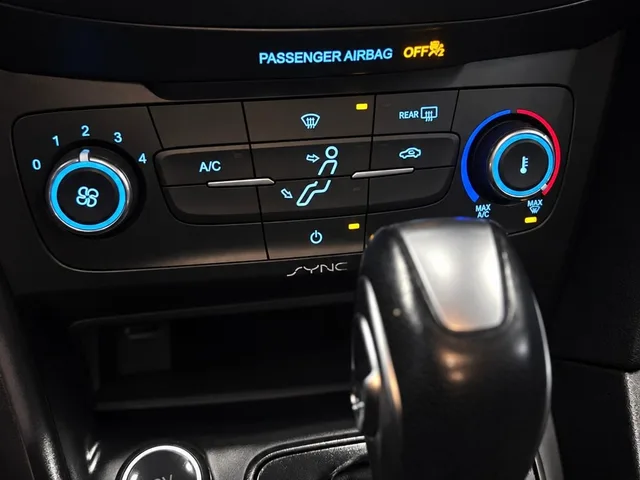 2016 Ford Focus SE: Front center armrest with storage