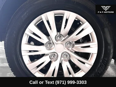 2012 Nissan Versa 1.8 S — Wheels