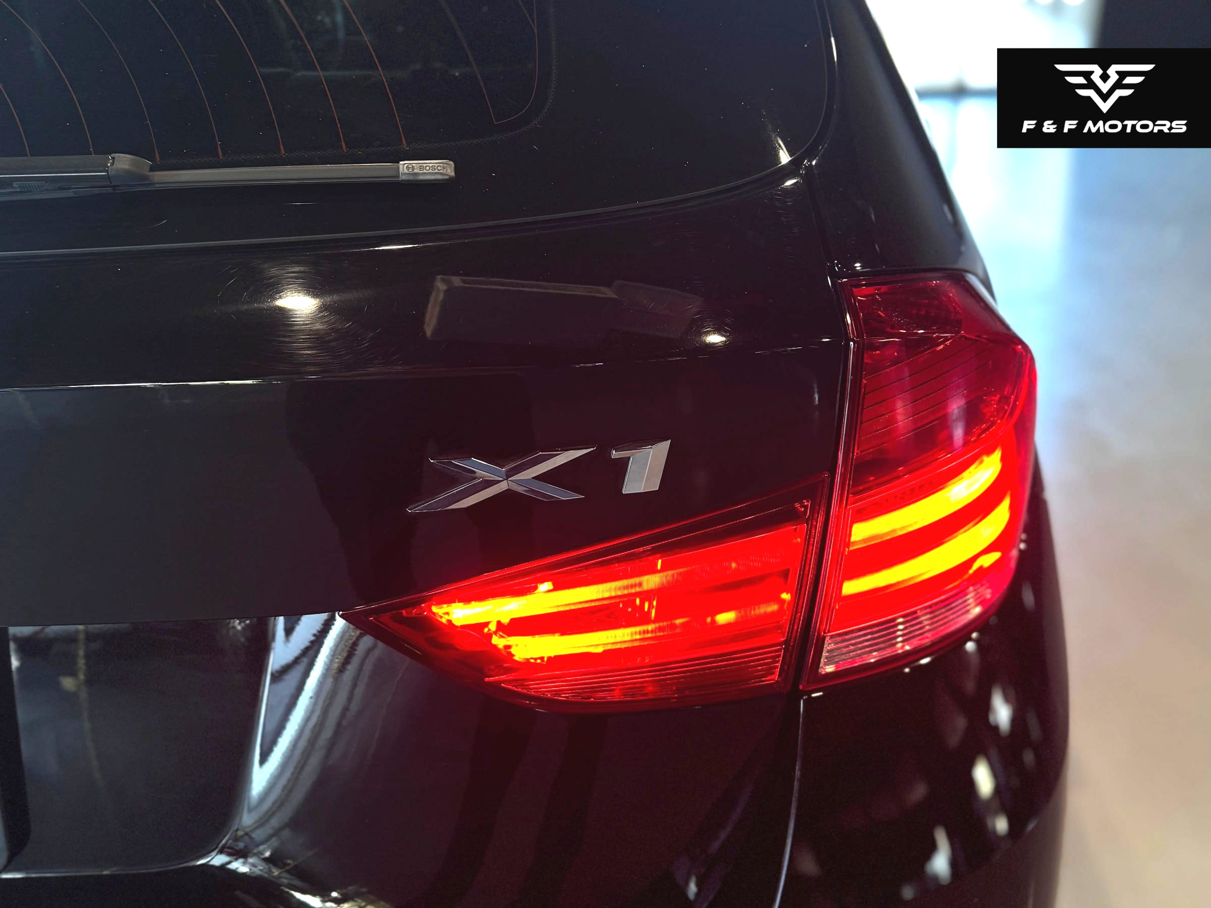 2013 BMW X1 xDrive28i — Damage